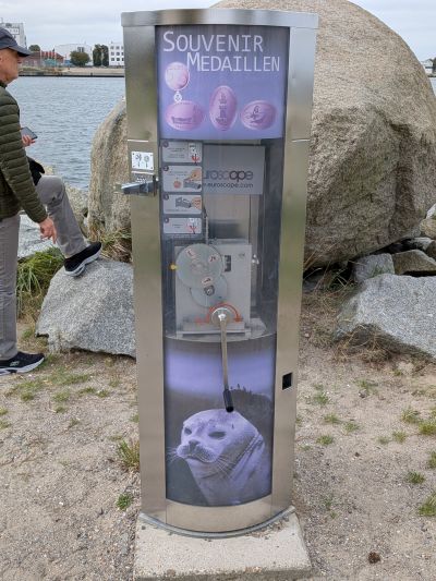Souvenirmünze – Motiv von Münzautomat Ostmole (R.-Warnemünde)