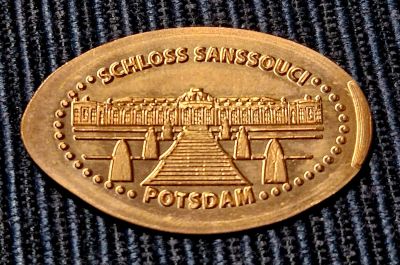 Moneda elongada – motivo de la máquina Park Sanssouci (Potsdam)