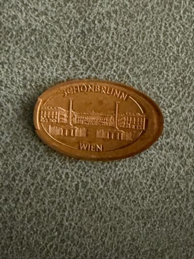 Souvenirmünze – Motiv von Münzautomat Schönbrunn Group Center (Schönbrunner Schloßstraße, 1130 Wien)