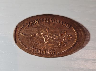 Souvenirmünze – Motiv von Münzautomat Schneebergbahn (Bahnstraße, 2734 Puchberg am Schneeberg)