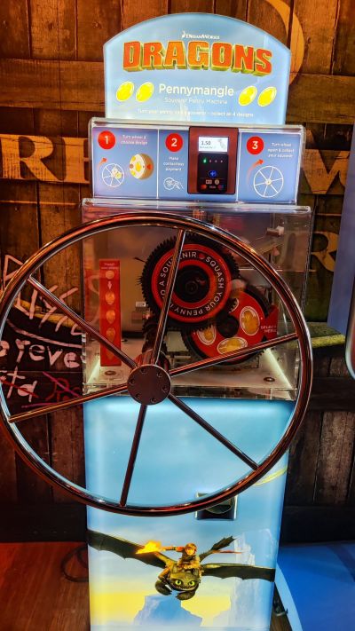 Muntautomaat Drachenzähmen im Shrek Shop in Groß-London – Titelafbeelding