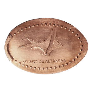 Signos claviformes – Moneda elongada