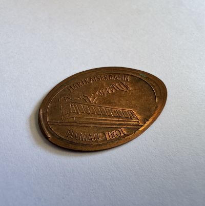 Souvenirmünze – Motiv von Münzautomat Hartkaiserbahn Ellmau (Ellmau, Bergstation)